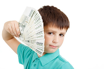 Image showing boy holding a fan from czech crown banknotes