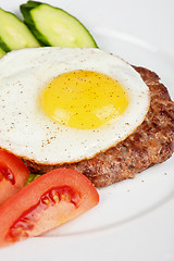 Image showing steak beef meat with fried egg