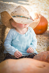 Image showing Adorable Baby Girl with Cowboy Hat at the Pumpkin Patch
