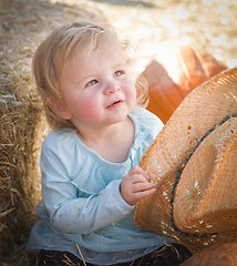 Image showing Adorable Baby Girl with Cowboy Hat at the Pumpkin Patch
