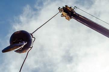 Image showing Crane hook on a blue sky