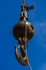 Image showing Crane hook on a blue sky