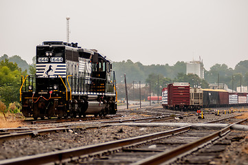 Image showing parked black freight train