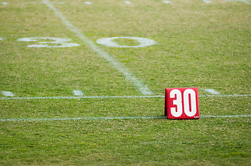 Image showing football field 30 twenty yard line marker
