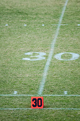 Image showing football field 30 twenty yard line marker
