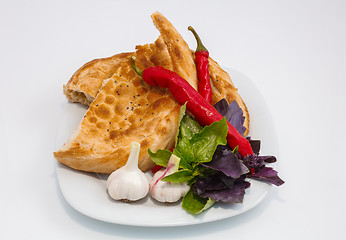 Image showing vegetables on a plate with a slice of bread