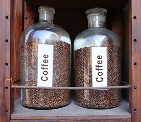 Image showing coffee grains in glass vessels