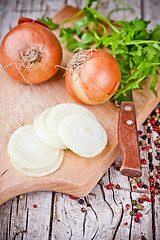 Image showing fresh onions, knife, and parsley 