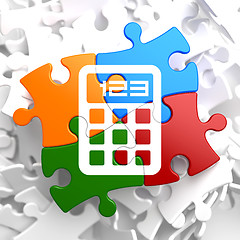 Image showing Calculator Icon on Multicolor Puzzle.