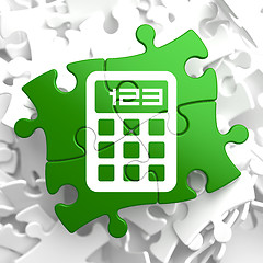 Image showing Calculator Icon on Green Puzzle.