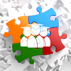 Image showing Group of Graduates Icon on Multicolor Puzzle.