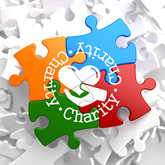 Image showing Charity Concept on Multicolor Puzzle.
