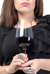 Image showing Young woman with red wine from a glass