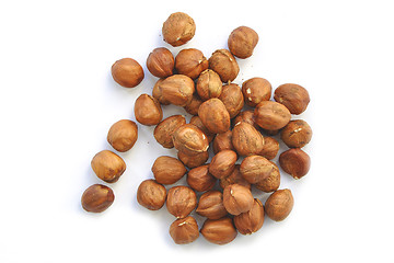 Image showing handful of nuts of a filbert on a white background