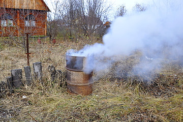 Image showing Grass burning in a flank on a country site in the fall