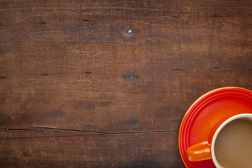 Image showing coffee on a grunge wooden table