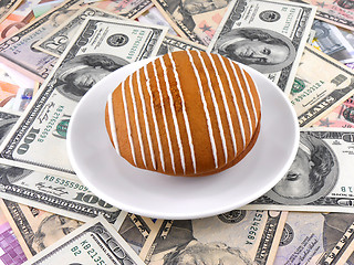 Image showing cake on money dollars background