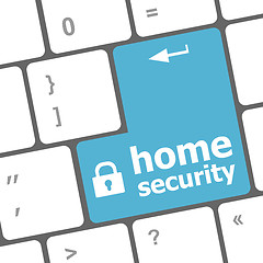 Image showing Safety concept: computer keyboard with Home security icon on enter button background