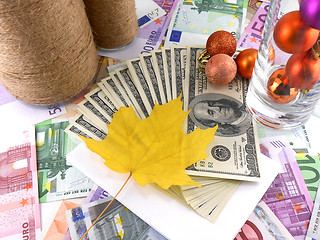 Image showing money wallpaper, maple leaves and christmas balls, new year celebration event