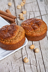 Image showing fresh buns with hazelnuts and cinnamon