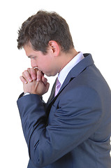 Image showing Praying businessman.