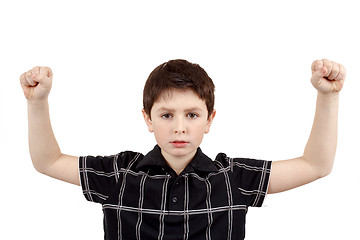 Image showing Portrait of a young boy with hand raised up