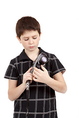 Image showing young boy with old vintage analog 8mm camera