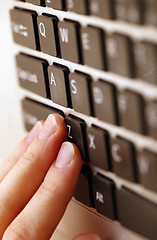 Image showing Young woman working on laptop