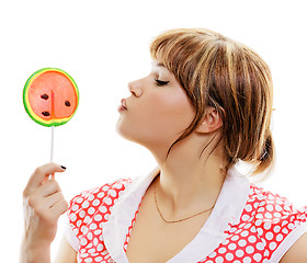 Image showing attractive girl with a round lollipop