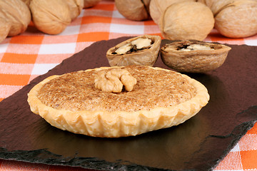 Image showing Walnut mini tarts and fruits