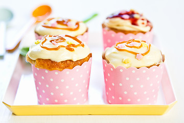 Image showing Cupcake with creamy butter on top