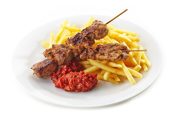 Image showing french fries and grilled kebab meat