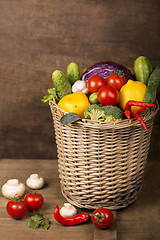 Image showing Healthy Organic Vegetables on a Wooden Background