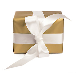 Image showing gift packed into golden box with White Ribbon