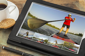 Image showing stand up paddling on digital tablet