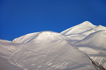 Image showing Off-piste slope and blue clear sky in nice winter morning