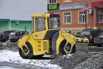 Image showing Special equipment on road repair. Skating rink