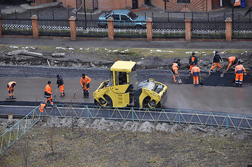 Image showing Special equipment on road repair. Skating rink