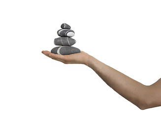 Image showing Balanced stones on a man Hand