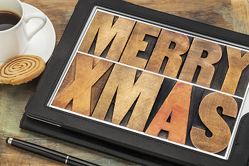 Image showing Merry Xmas on digital tablet