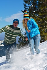 Image showing Young Couple In Winter  Snow Scene