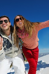 Image showing Young Couple In Winter  Snow Scene