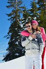 Image showing Young Couple In Winter  Snow Scene