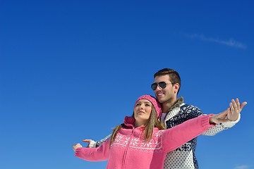 Image showing Young Couple In Winter  Snow Scene