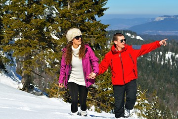 Image showing Young Couple In Winter  Snow Scene