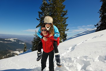 Image showing Young Couple In Winter  Snow Scene