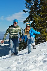 Image showing Young Couple In Winter  Snow Scene