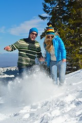 Image showing Young Couple In Winter  Snow Scene