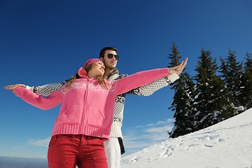 Image showing Young Couple In Winter  Snow Scene