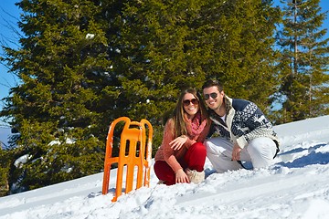 Image showing Young Couple In Winter  Snow Scene